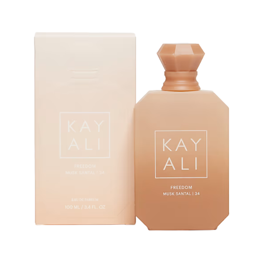 Kay Ali Freedom Musk Santal 34 Eau de Toilette bottle and packaging box, both in a warm peach-beige color, on a solid white background.