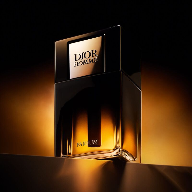 Dior Homme parfum bottle with a dark background