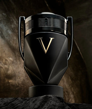Black and gold product with a prominent 'V' logo on a textured dark background