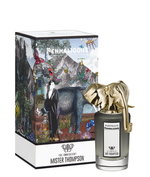 Perfume bottle with decorative box featuring artistic design
