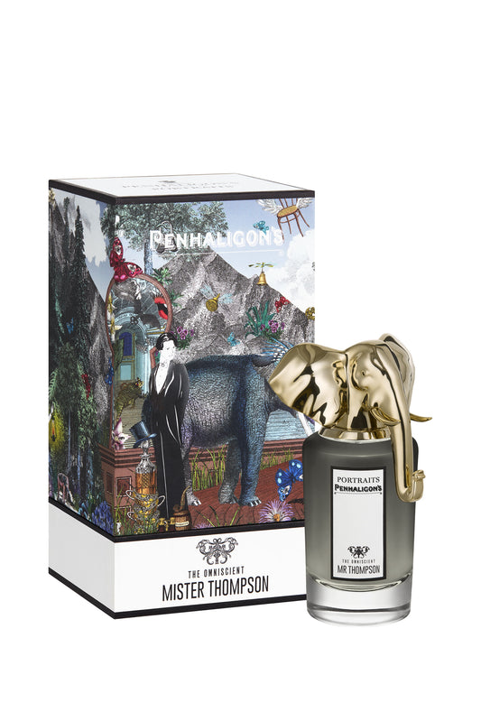 Perfume bottle with decorative box featuring artistic design