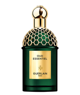 Guerlain Oud Essentiel perfume bottle with gold cap on a white background