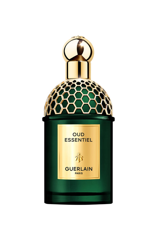 Guerlain Oud Essentiel perfume bottle with gold cap on a white background