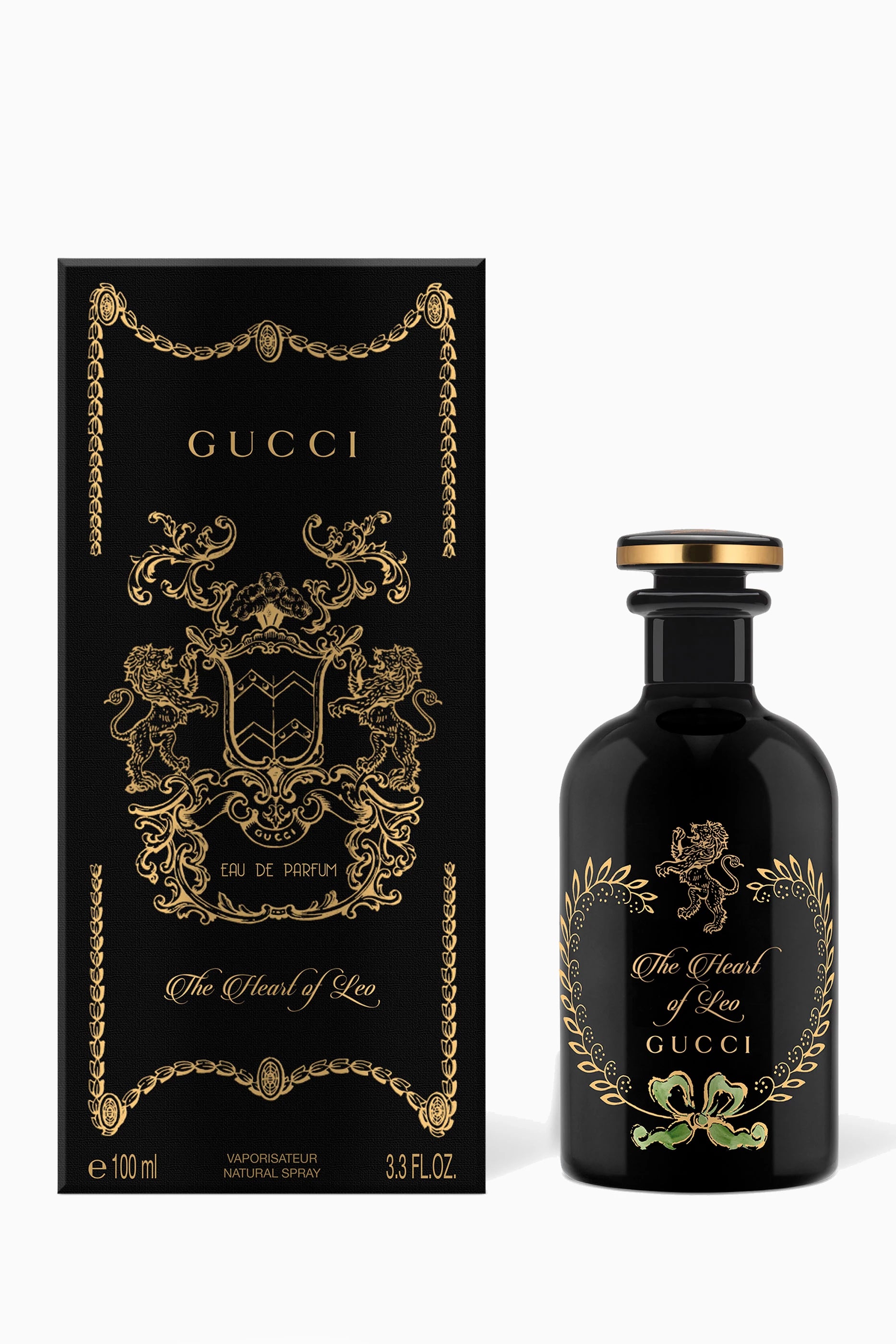 Gucci perfume bottle and packaging on a white background