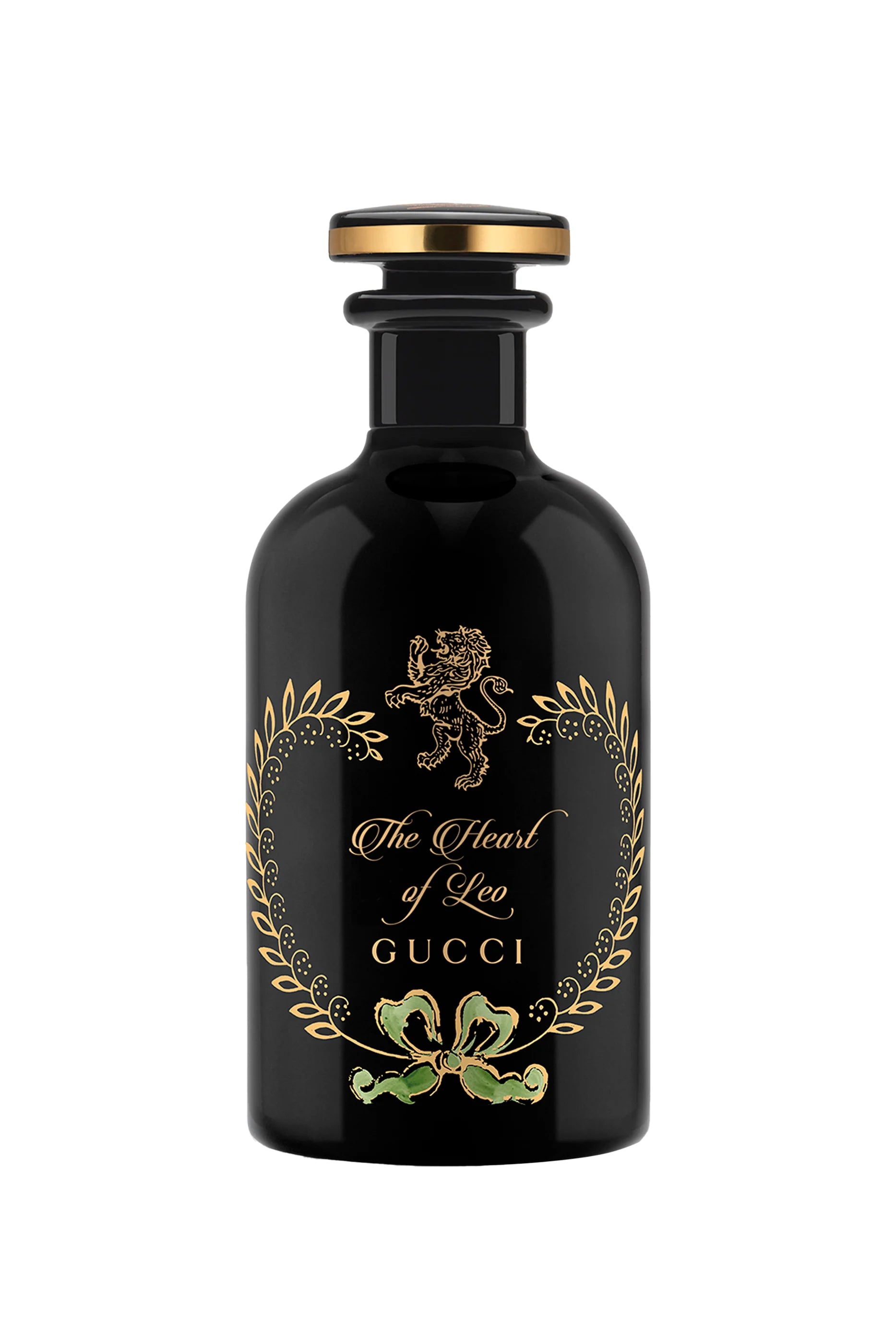 Black Gucci perfume bottle with gold and green design on a white background