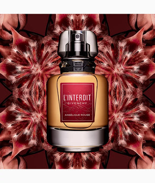 Givenchy L'Interdit perfume bottle on a red floral background
