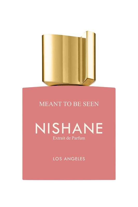 Nishane perfume bottle with gold cap on a white background