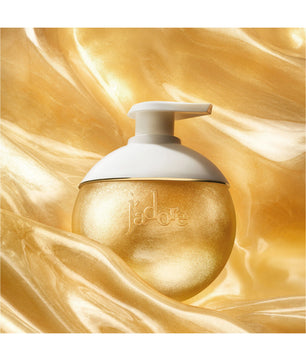 Gold bottle with white cap on a gold swirling background