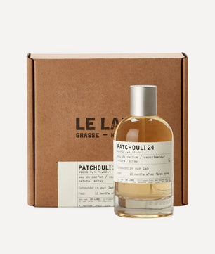 Le Labo Patchouli 24 perfume bottle with packaging on a white background