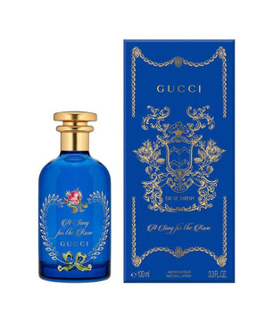 Gucci perfume bottle and packaging on a white background