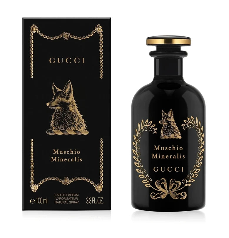 Gucci Muschio Mineralis perfume bottle and packaging on a white background