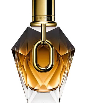 Perfume bottle with gold cap and clear glass body on a white background