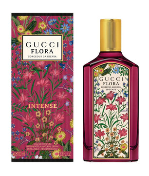 Gucci Flora perfume bottle and packaging with floral design on a white background