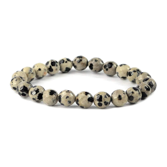 Beaded bracelet with black and white pattern on a white background