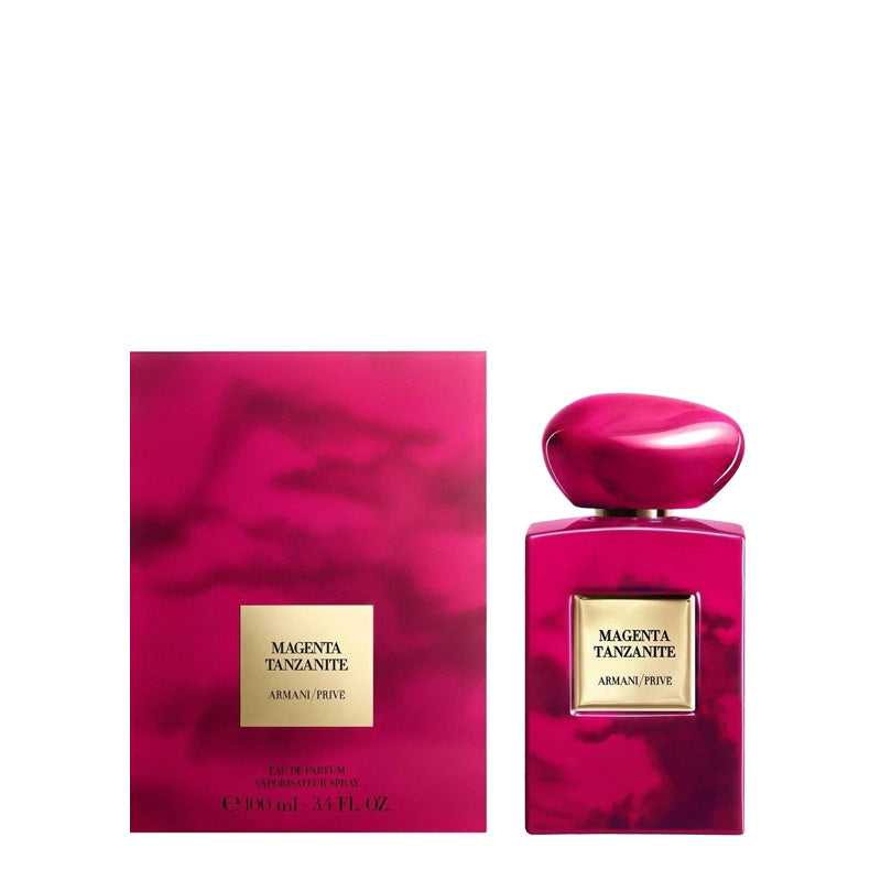 Pink Armani Prive perfume bottle and packaging on a white background