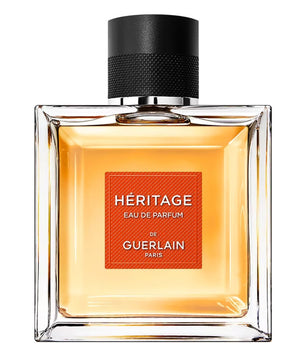 Perfume bottle of Guerlain Héritage on a white background