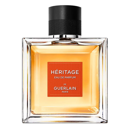 Perfume bottle of Guerlain Héritage on a white background