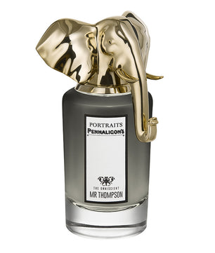 Penhaligon's Portraits Mr Thompson perfume bottle with gold elephant cap on a white background