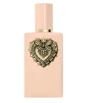 Pink perfume bottle with decorative heart emblem on a white background
