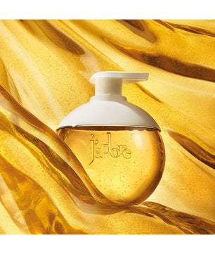 White bottle with pump on a yellow fabric background
