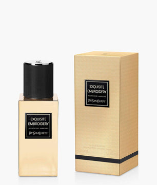 Perfume bottle and packaging with 'Exquisite Embroidery' label on a white background