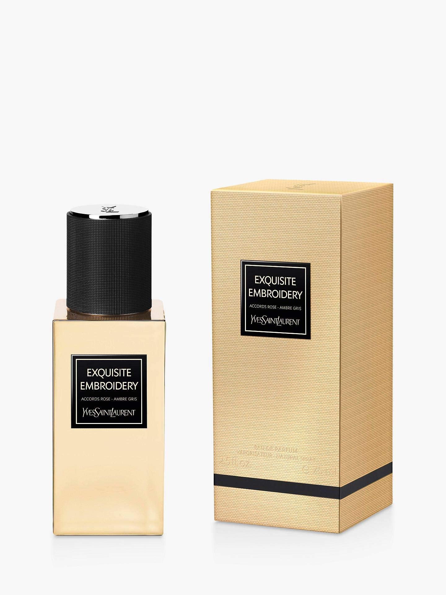 Perfume bottle and packaging with 'Exquisite Embroidery' label on a white background