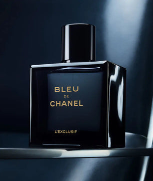Bleu de Chanel perfume bottle on a dark background