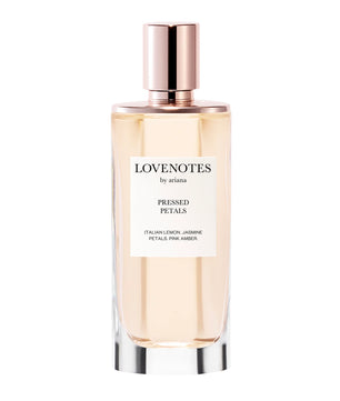 Perfume bottle labeled 'Lovenotes by Ariana' on a white background