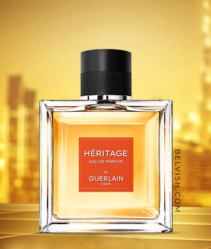 Perfume bottle labeled 'Heritage' by Guerlain on a gold background