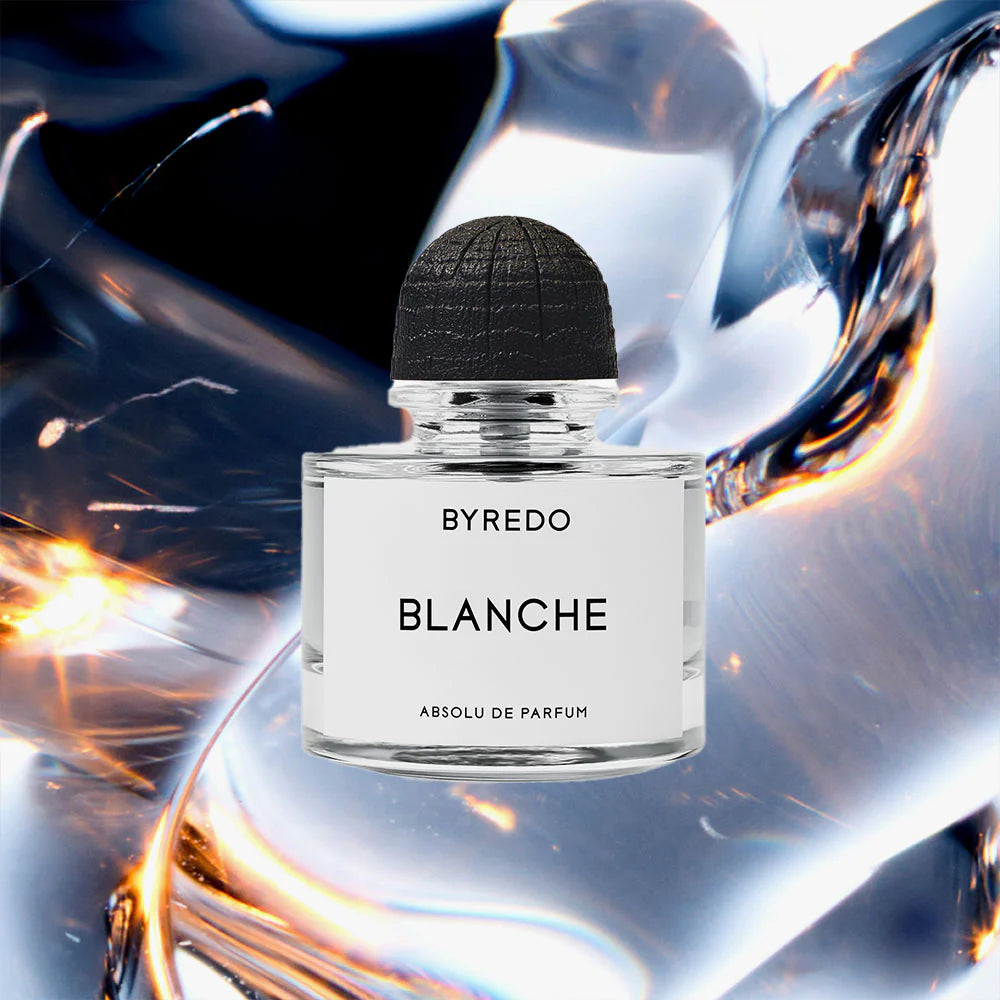 BYREDO Blanche perfume bottle on a dynamic background