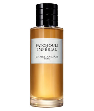 Christian Dior Patchouli Impérial perfume bottle with amber liquid, a white label, and a black cap on a white background.