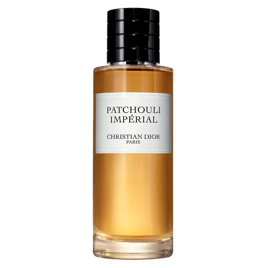 Christian Dior Patchouli Impérial perfume bottle with amber liquid, a white label, and a black cap on a white background.