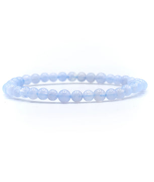 Light blue beaded bracelet on a white background