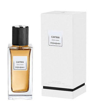 Perfume bottle and packaging of 'Caftan' by Yves Saint Laurent on a white background