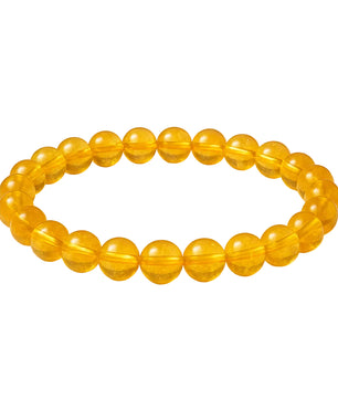 Yellow beaded bracelet on a white background