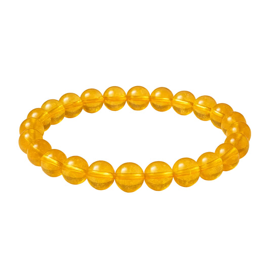 Yellow beaded bracelet on a white background