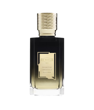 Perfume bottle with gold cap and label on a white background