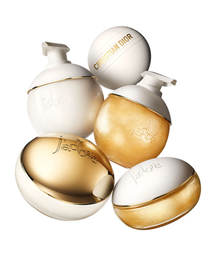 Set of Christian Dior perfume bottles on a white background