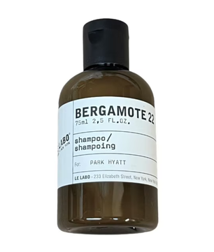 Bottle of Bergamote 22 shampoo with a black cap on a white background