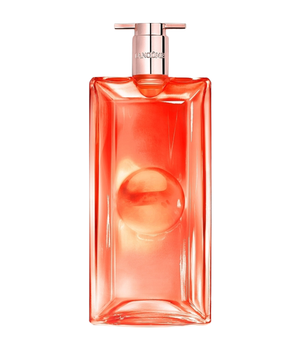 A rectangular glass perfume bottle with a rounded geometric design, filled with a translucent coral-pink liquid and topped with a metallic rose-gold cap. The brand name 'LANEIGE' is visible on the neck of the bottle.