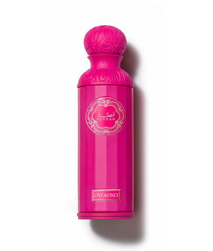 Pink perfume bottle with decorative cap on a white background