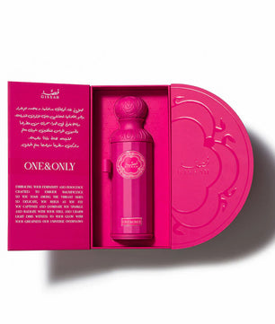 Pink 'ONE&ONLY' perfume bottle in an open pink box on a white background