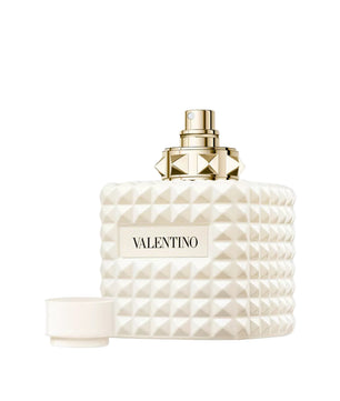 Valentino perfume bottle with geometric design on a white background