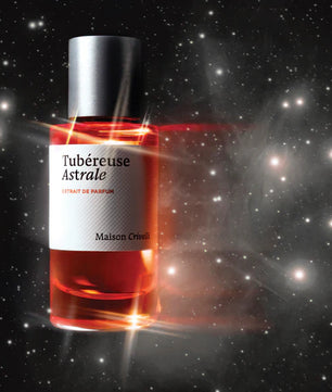 Perfume bottle labeled 'Tubereuse Astrale' against a starry space background