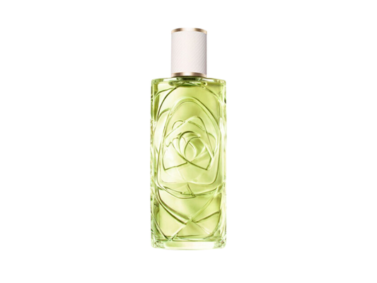 Perfume bottle with floral design on a white background