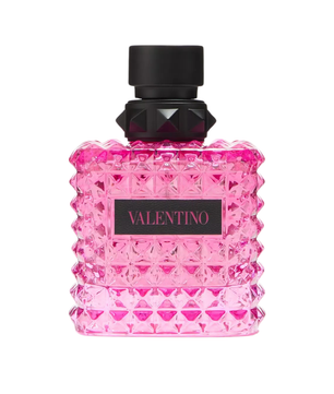 Pink perfume bottle with black cap on a white background