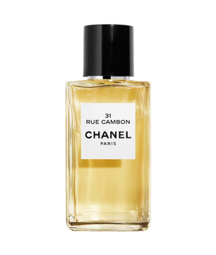 Chanel perfume bottle with a white label on a white background