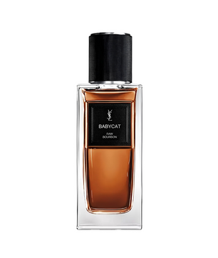 Perfume bottle with black cap and clear glass body on a white background