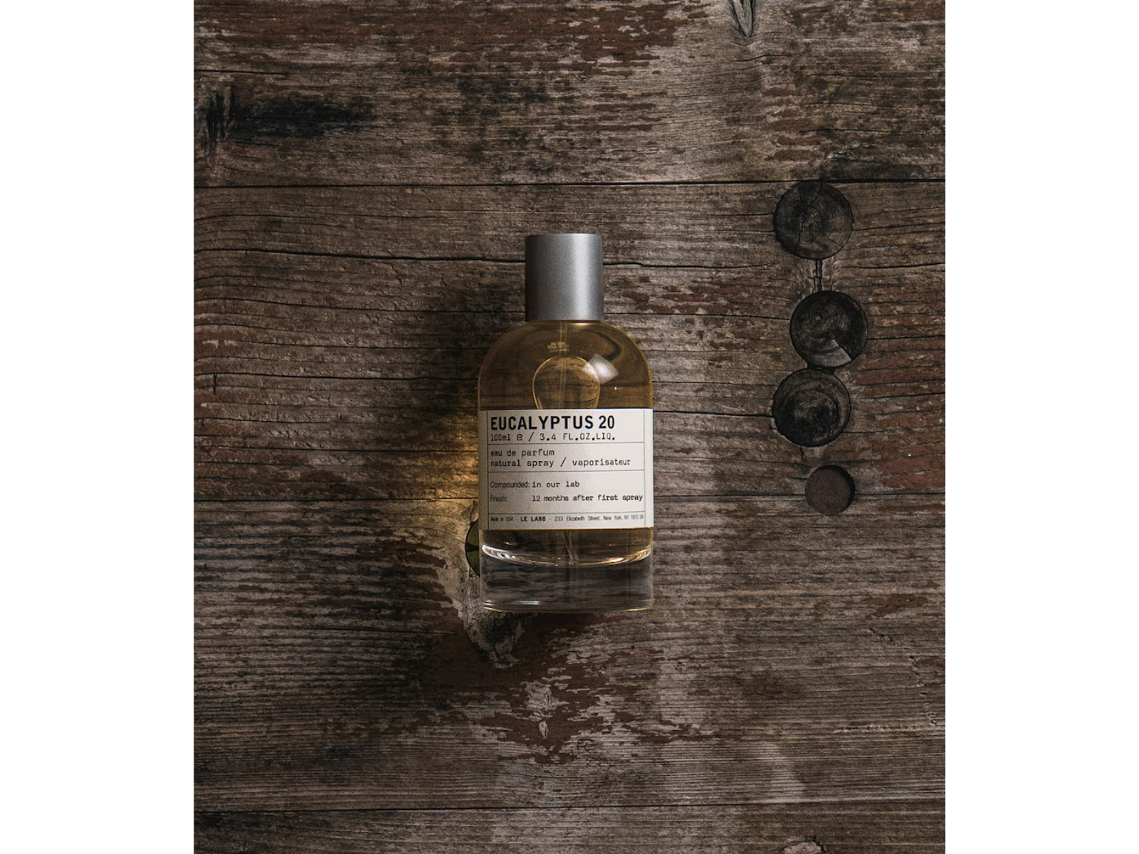 Bottle of Eucalyptus 20 on a wooden surface