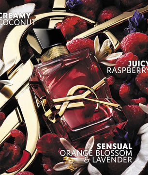 Red perfume bottle with gold accents on a floral and fruit background